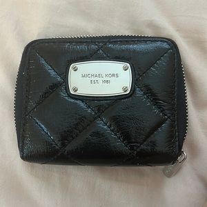 Black shiny brand new Michael Koran mini wallet